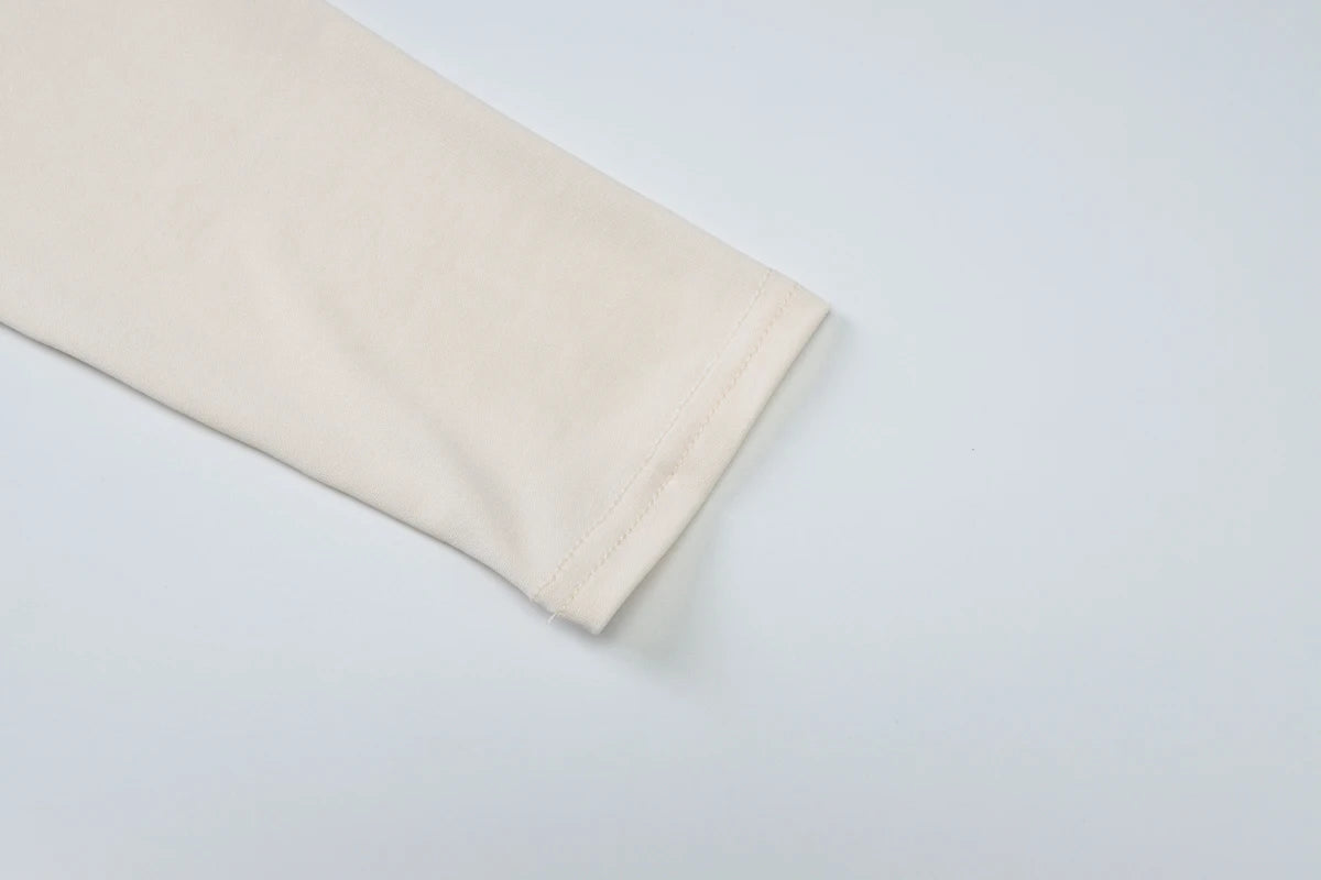 The Isolde Asymmetric Slim Top