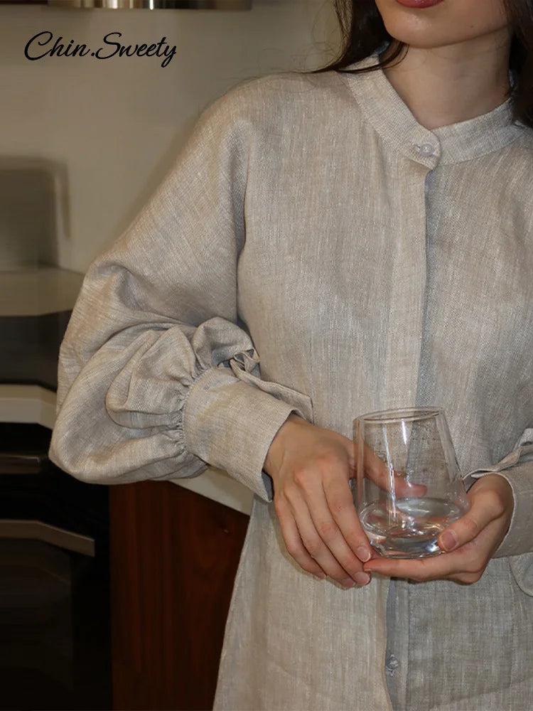 [The Veyra Timeless Button-Front Dress]