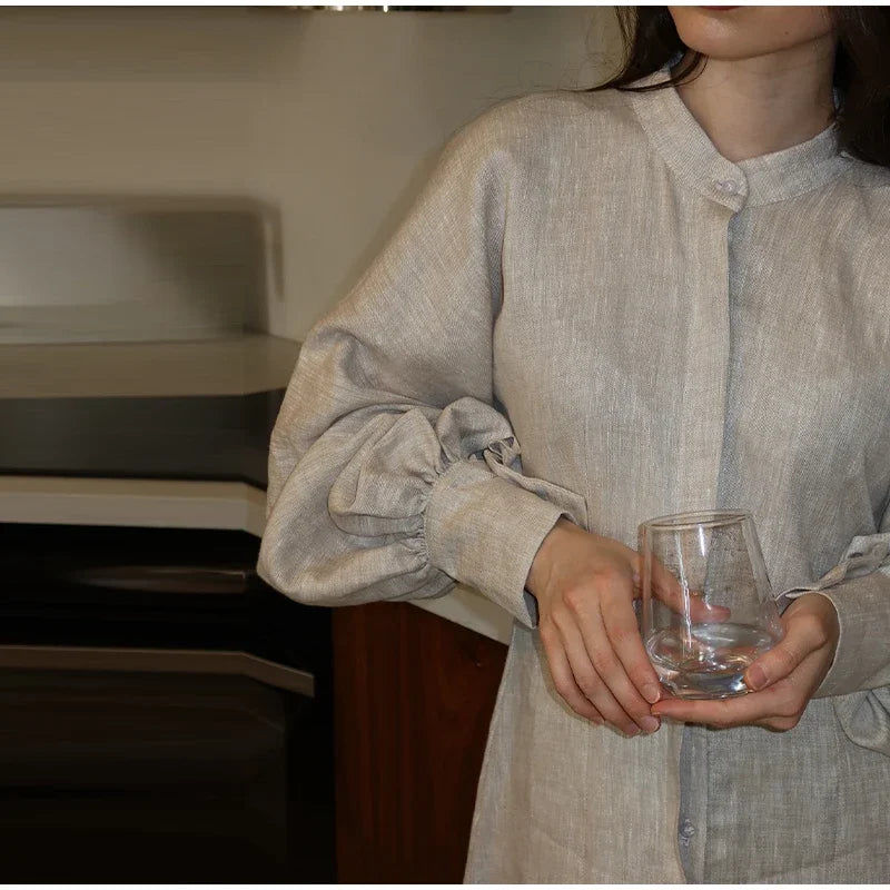 [The Veyra Timeless Button-Front Dress]